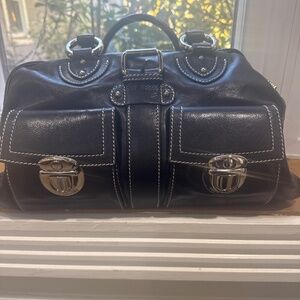 Marc Jacobs satchel bag. Leather with silver buckles and zipper.